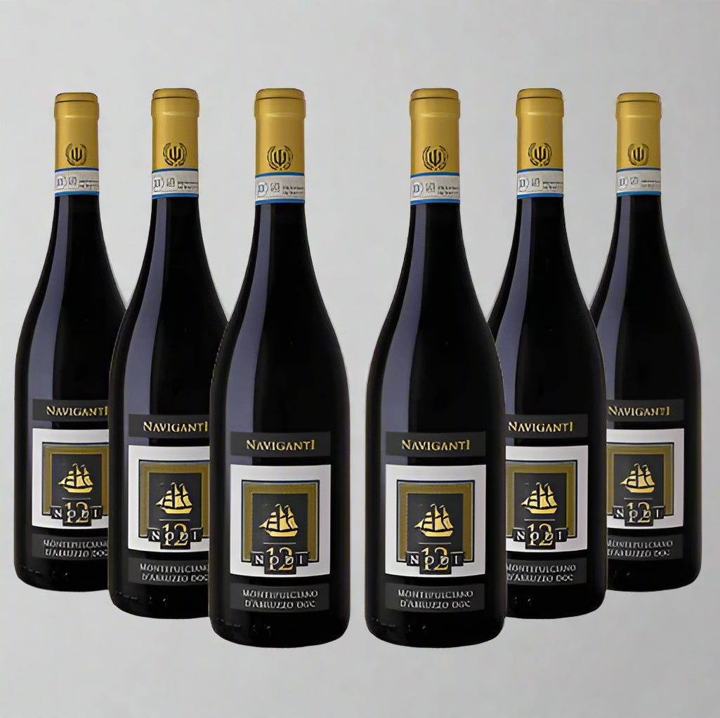 Six bottles of Naviganti Montepulciano d'Abruzzo DOC wine on a white background